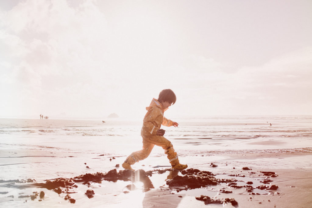Child on beach Oregon Coast